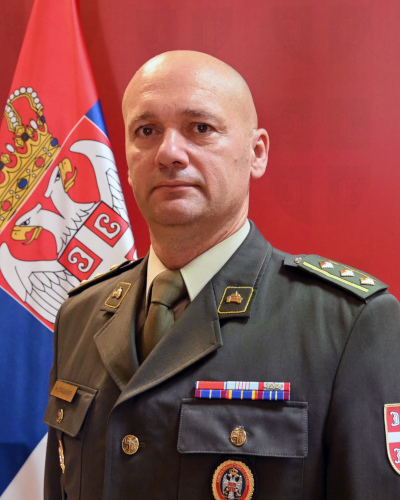 Полковник Никола Оташевиħ. Эмблемы бронетанковых
частей