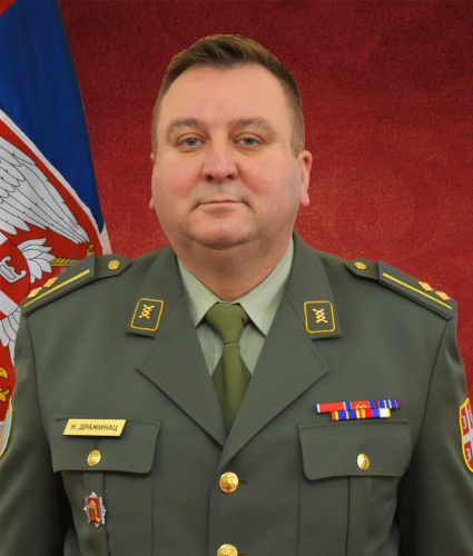 Подполковник Ненад Дражинац. Эмблемы службы
телекоммуникаций